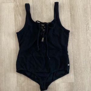 Lace up front ribbed body suit